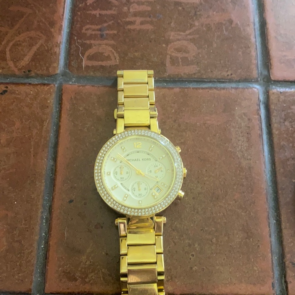 Gold MK watch